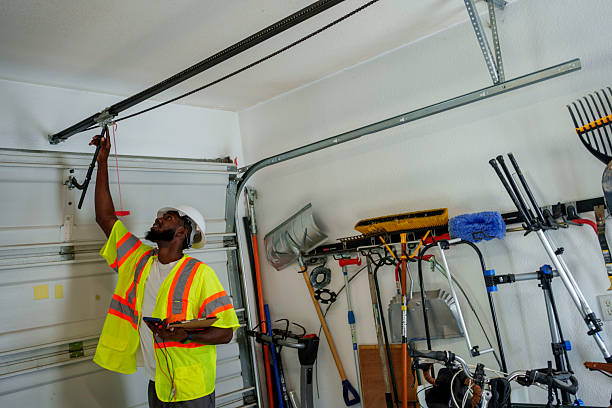 Professional Garage Door Panel Replacement technician working in Covington city County, VA